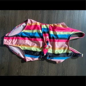 Multi colored stripped goes one piece swim suit